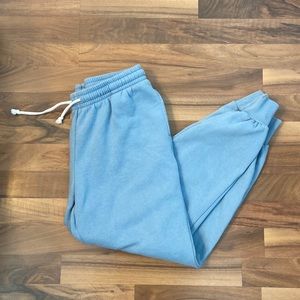Blue sweatpants by wild fable. Elastic waistband with tie. Has pockets